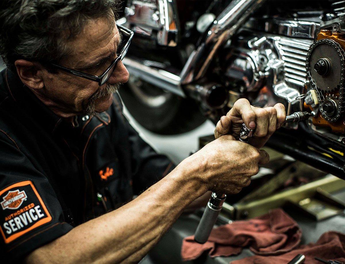 Mechanic Servicing a motorcycle